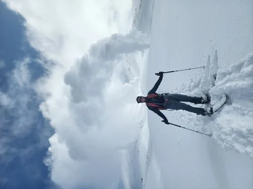 Skier near steaming volcanic vents