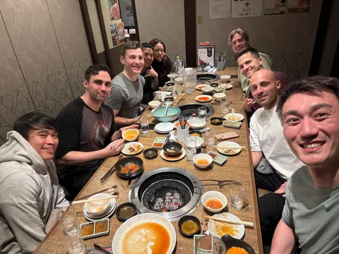 Housemates around a yakiniku dinner table